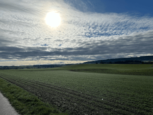 Various cloud compilations above rural field. 