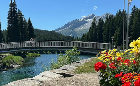 San Bernardino village river bank with bridge by sport center